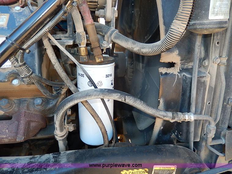 image for item I9484 1997 Mack CL713 triple axle semi truck