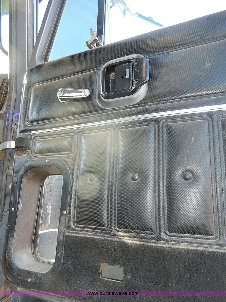 image for item I9484 1997 Mack CL713 triple axle semi truck