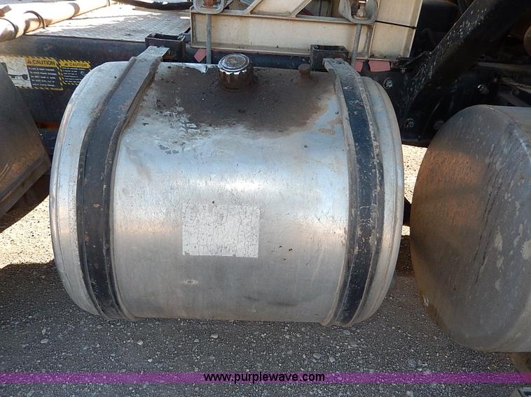 image for item I9484 1997 Mack CL713 triple axle semi truck