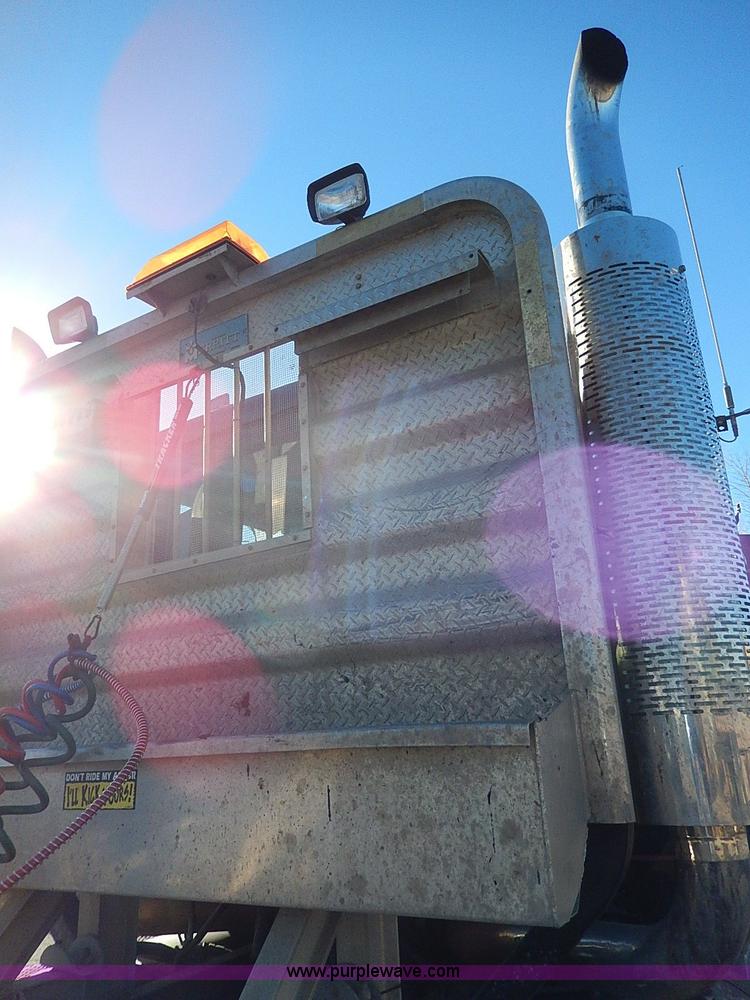 image for item I9484 1997 Mack CL713 triple axle semi truck