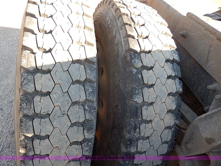 image for item I9484 1997 Mack CL713 triple axle semi truck