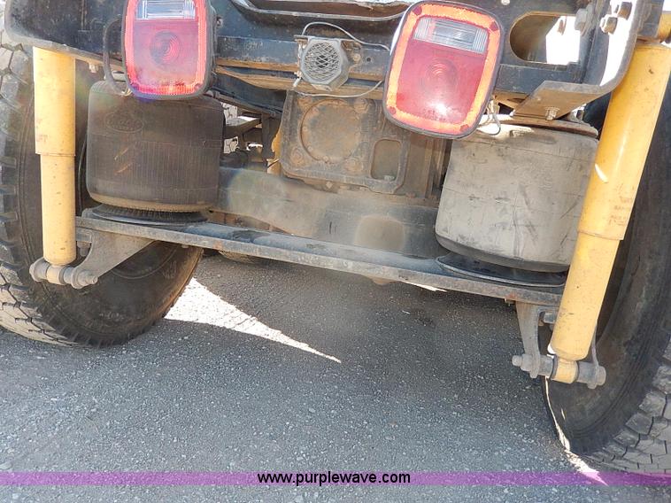 image for item I9484 1997 Mack CL713 triple axle semi truck