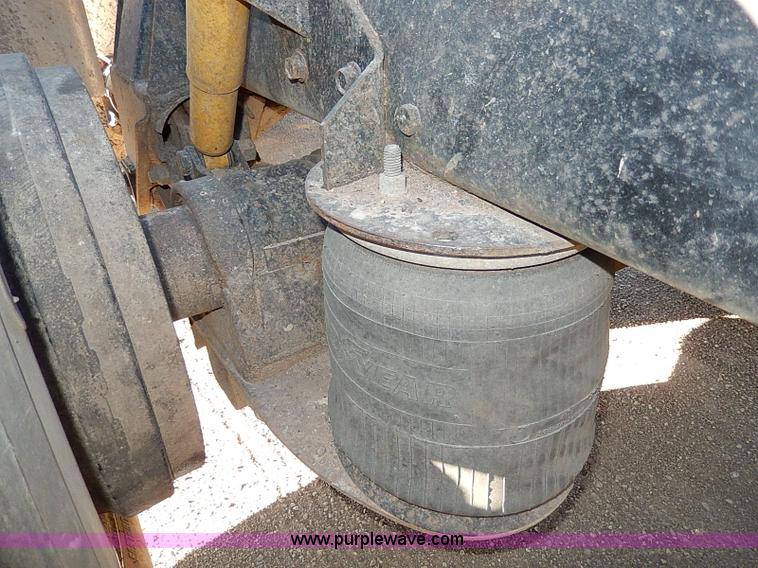 image for item I9484 1997 Mack CL713 triple axle semi truck