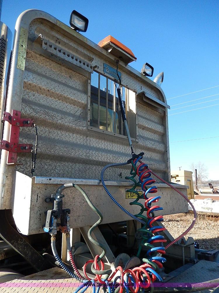 image for item I9484 1997 Mack CL713 triple axle semi truck