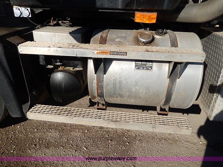 image for item I9484 1997 Mack CL713 triple axle semi truck