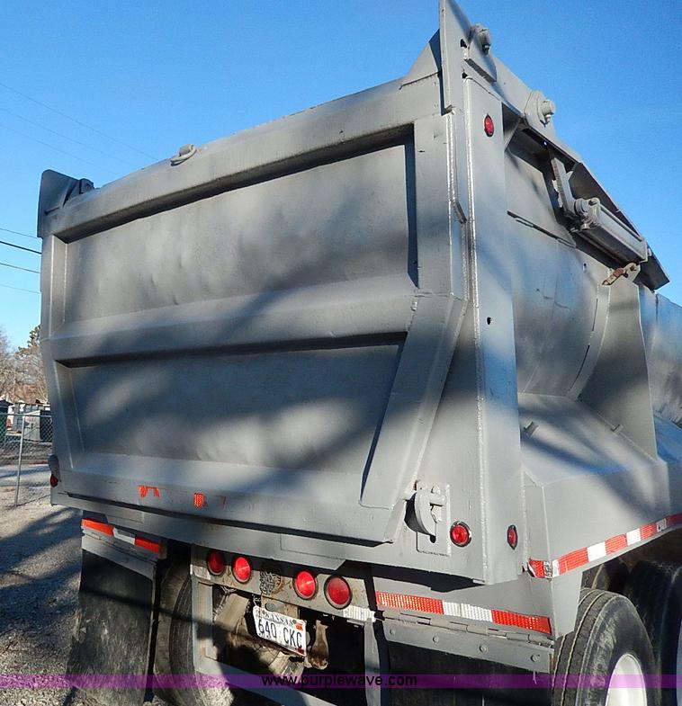 image for item I9486 1986 Bobko barrel end dump trailer