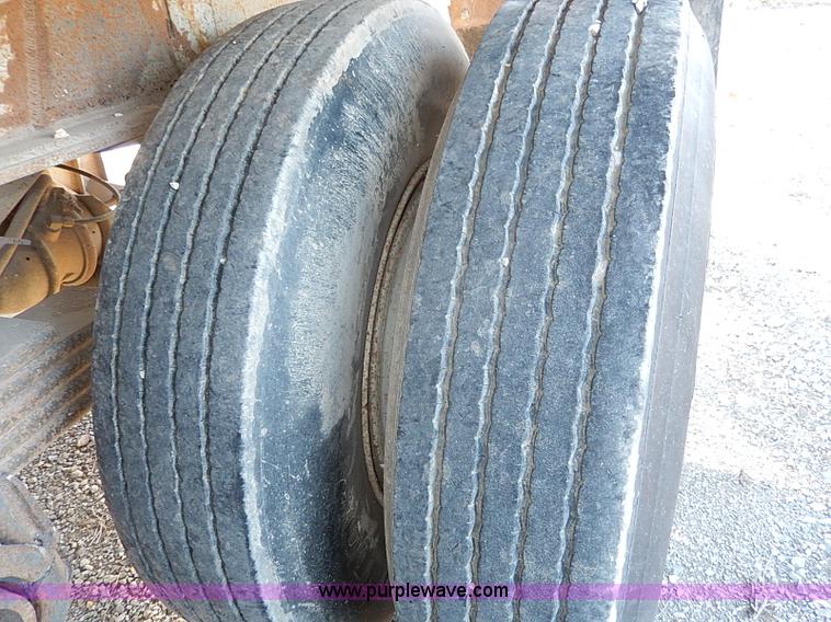 image for item I9486 1986 Bobko barrel end dump trailer