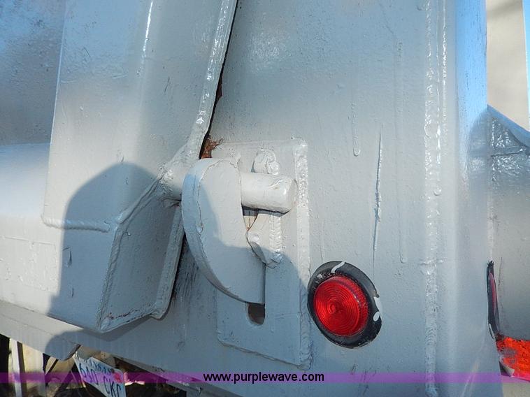 image for item I9486 1986 Bobko barrel end dump trailer