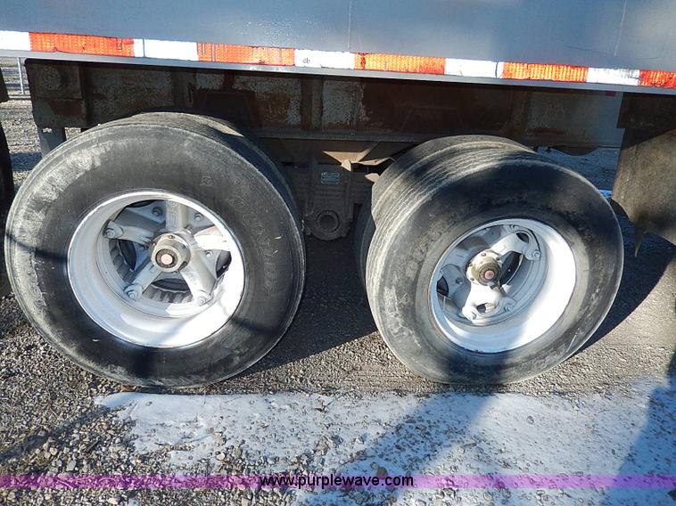 image for item I9486 1986 Bobko barrel end dump trailer