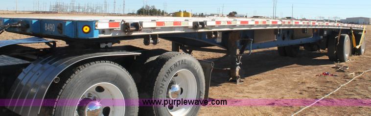 image for item C3613 2000 Manac 16248801 flatbed semi trailer