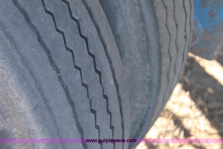 image for item C3613 2000 Manac 16248801 flatbed semi trailer