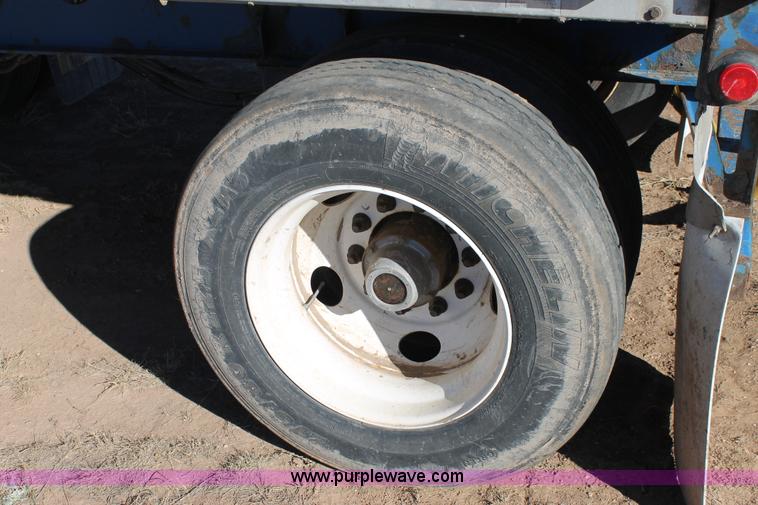 image for item C3613 2000 Manac 16248801 flatbed semi trailer