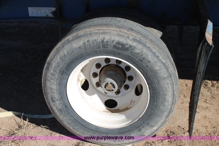 image for item C3613 2000 Manac 16248801 flatbed semi trailer