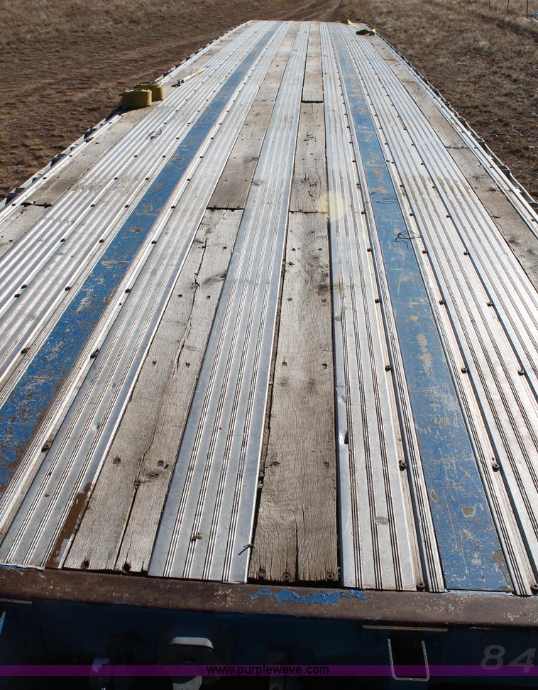 image for item C3613 2000 Manac 16248801 flatbed semi trailer