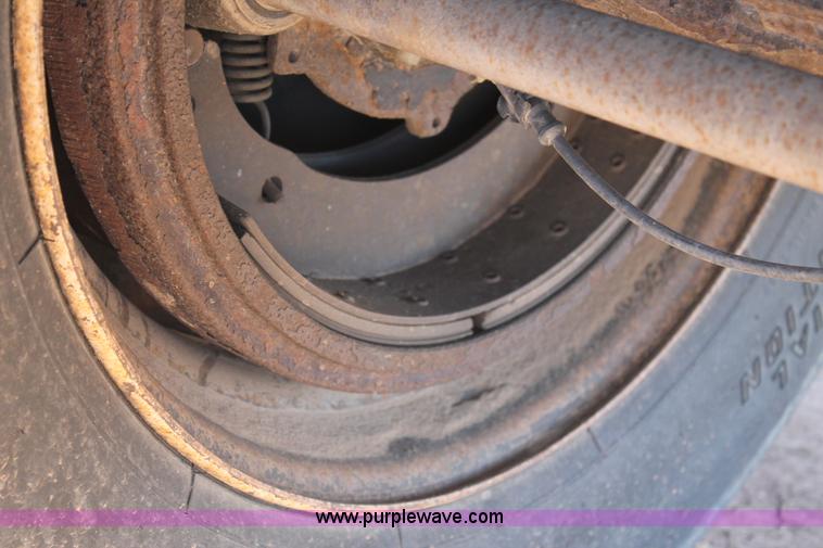 image for item C3613 2000 Manac 16248801 flatbed semi trailer