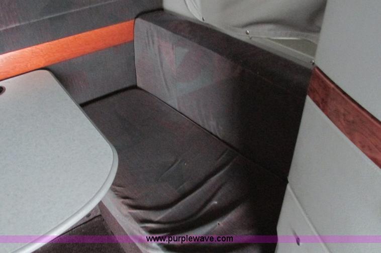 image for item E5240 2004 Volvo VNL 64T semi truck