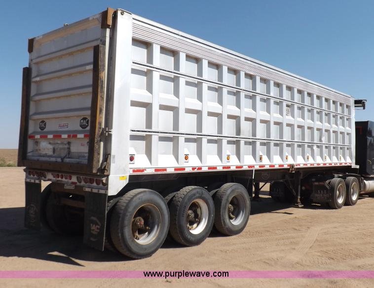 image for item I7584 2000 Mack end dump trailer