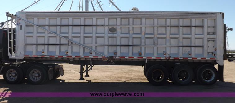 image for item I7584 2000 Mack end dump trailer