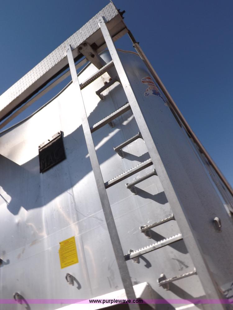 image for item I7584 2000 Mack end dump trailer