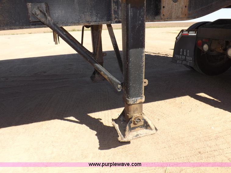 image for item I7584 2000 Mack end dump trailer