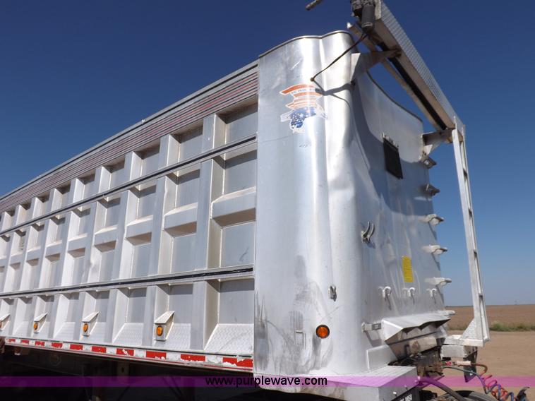 image for item I7584 2000 Mack end dump trailer