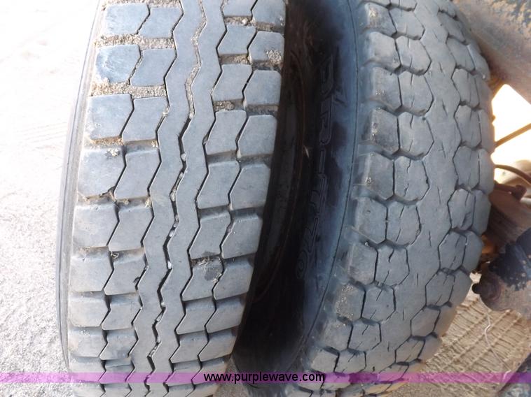 image for item I7584 2000 Mack end dump trailer