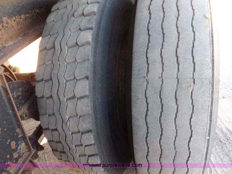 image for item I7584 2000 Mack end dump trailer