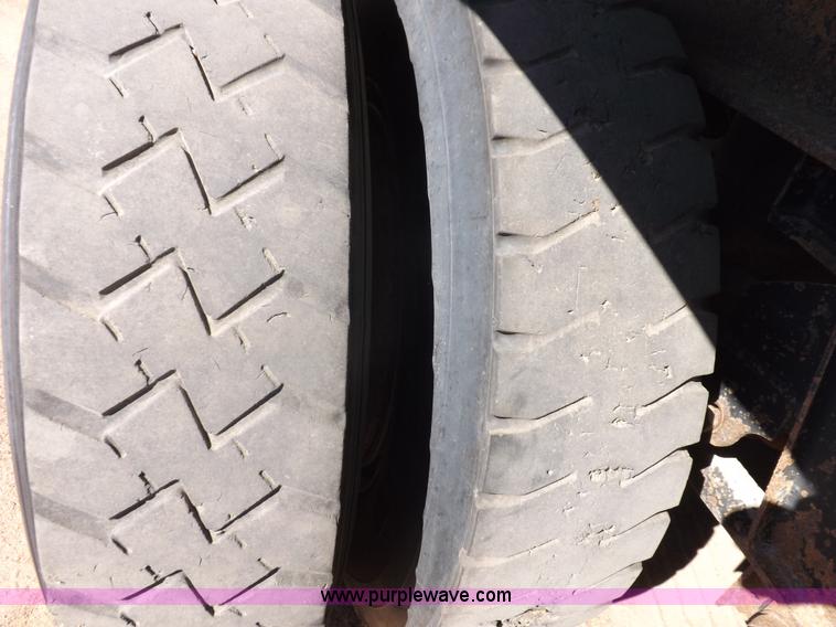 image for item I7584 2000 Mack end dump trailer