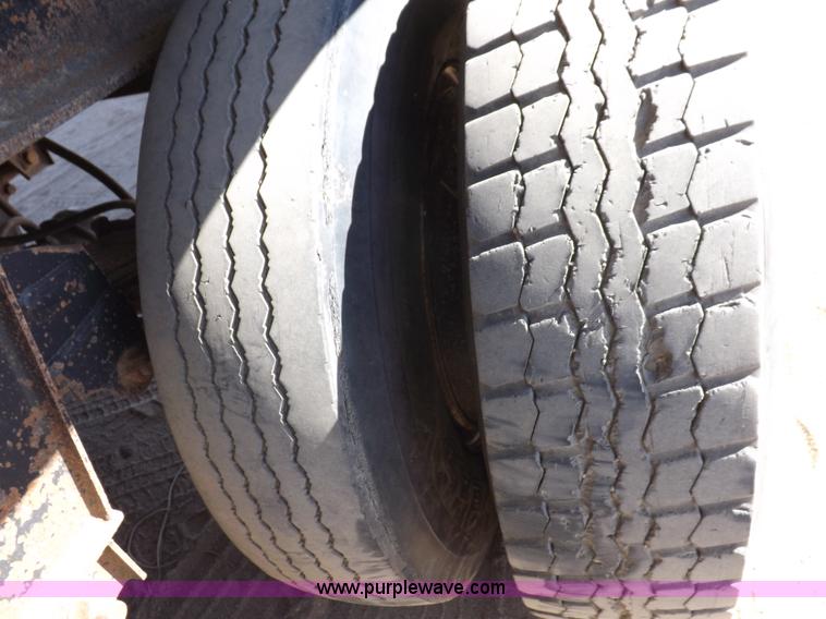 image for item I7584 2000 Mack end dump trailer