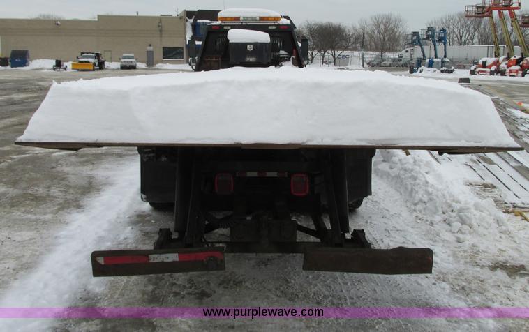 image for item G9185 2006 Freightliner Business Class M2 rollback truck