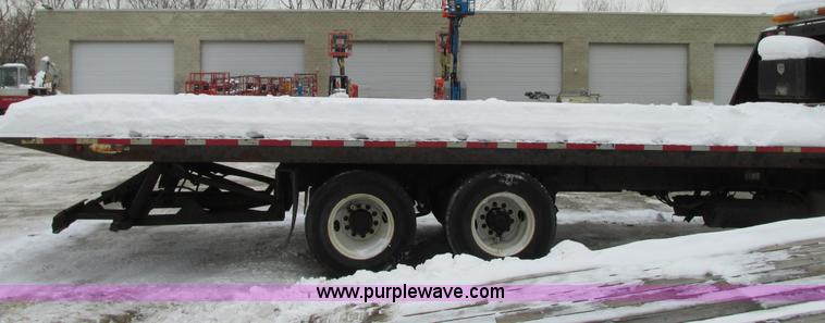 image for item G9185 2006 Freightliner Business Class M2 rollback truck