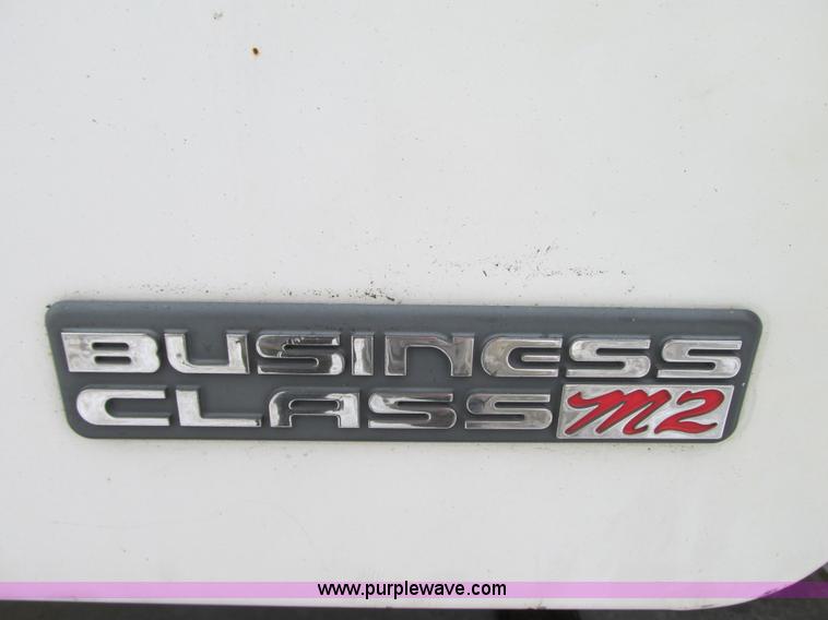 image for item G9185 2006 Freightliner Business Class M2 rollback truck