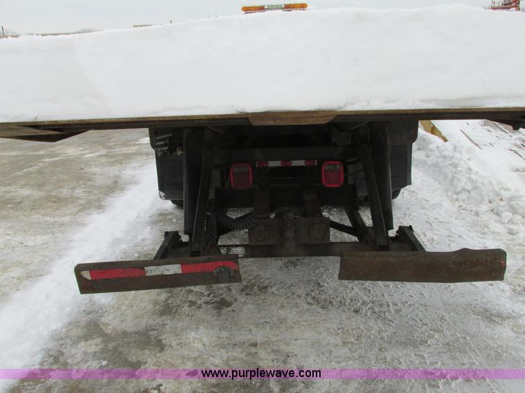 image for item G9185 2006 Freightliner Business Class M2 rollback truck