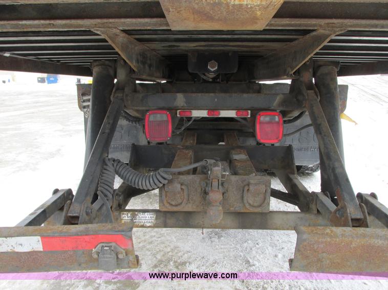 image for item G9185 2006 Freightliner Business Class M2 rollback truck