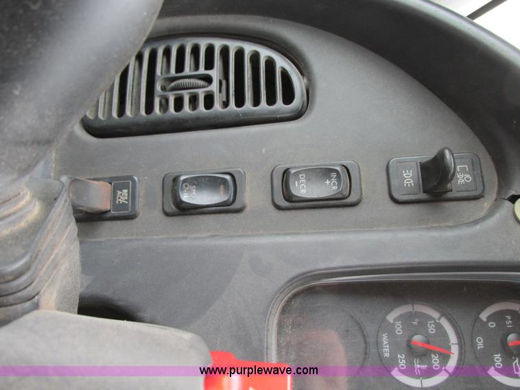 image for item G9185 2006 Freightliner Business Class M2 rollback truck