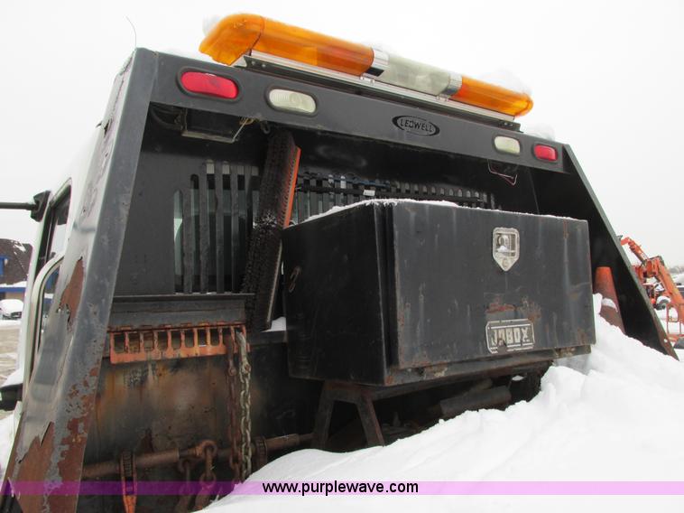 image for item G9185 2006 Freightliner Business Class M2 rollback truck