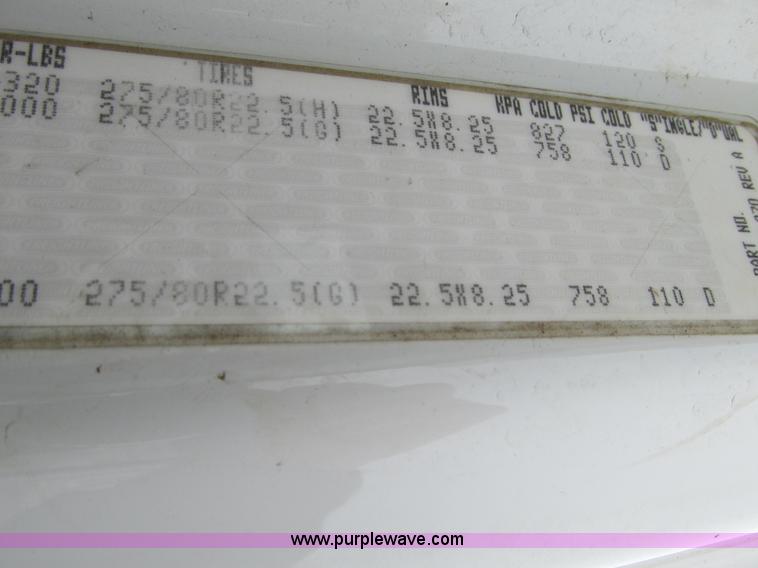 image for item G9185 2006 Freightliner Business Class M2 rollback truck