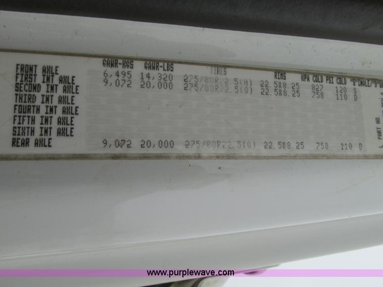 image for item G9185 2006 Freightliner Business Class M2 rollback truck