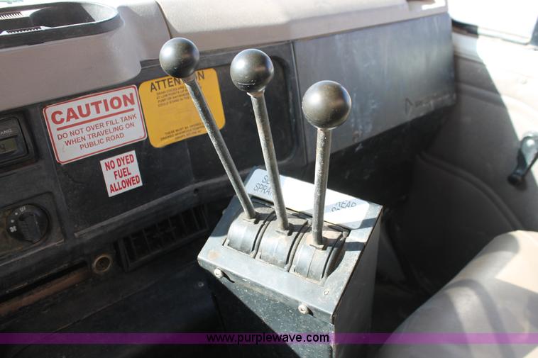 image for item H8307 1999 International 4700 water truck