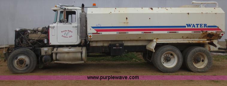image for item F8083 1987 Mack RW713 water truck