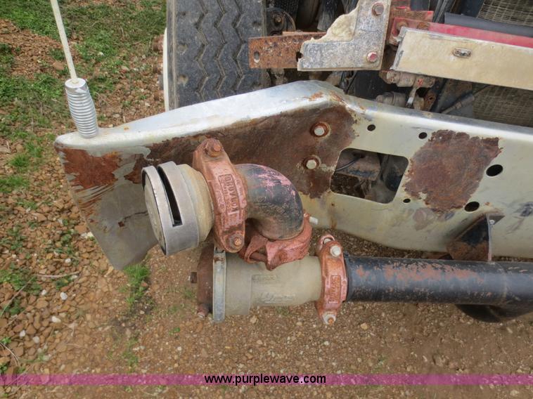 image for item F8083 1987 Mack RW713 water truck