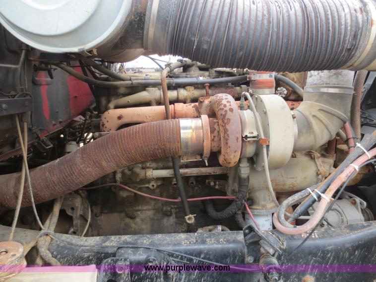 image for item F8083 1987 Mack RW713 water truck