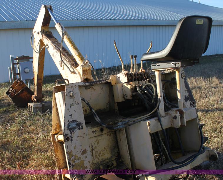 image for item AE9085 John Deere 51 backhoe attachment