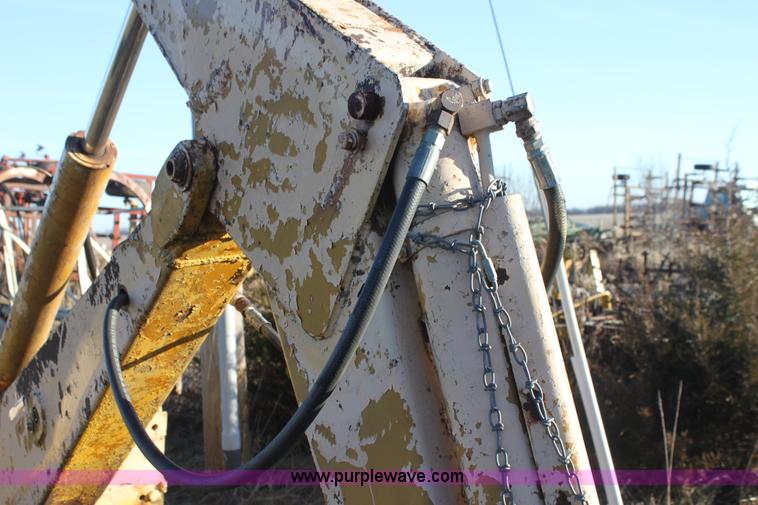 image for item AE9085 John Deere 51 backhoe attachment