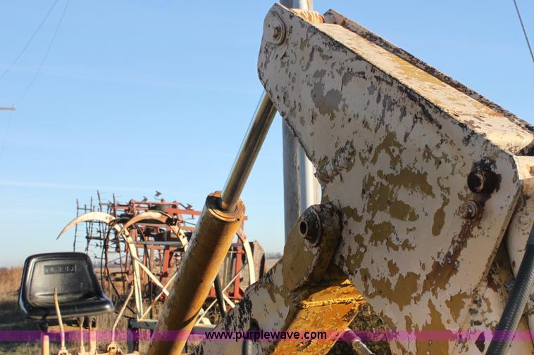 image for item AE9085 John Deere 51 backhoe attachment