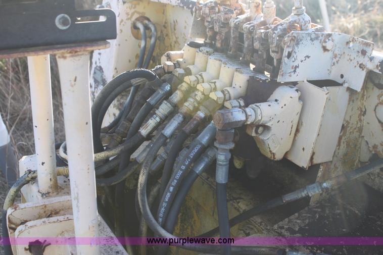 image for item AE9085 John Deere 51 backhoe attachment