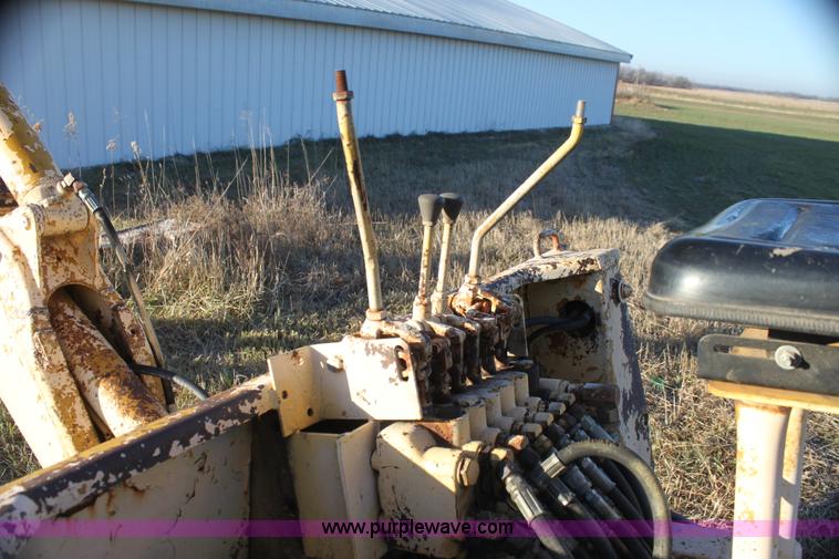 image for item AE9085 John Deere 51 backhoe attachment