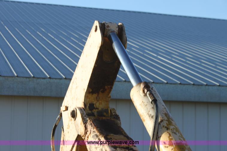 image for item AE9085 John Deere 51 backhoe attachment