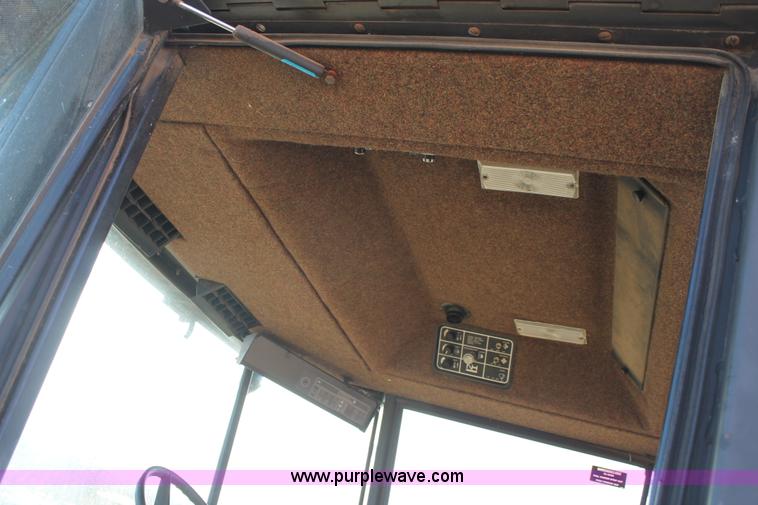 image for item C3671 1995 New Holland 2550 swather