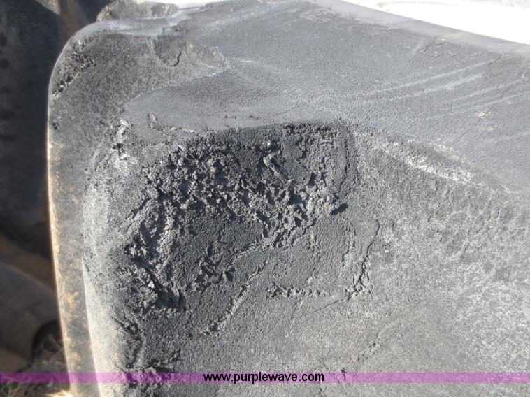 image for item F8075 (2) Firestone 76x50.00-32 tires